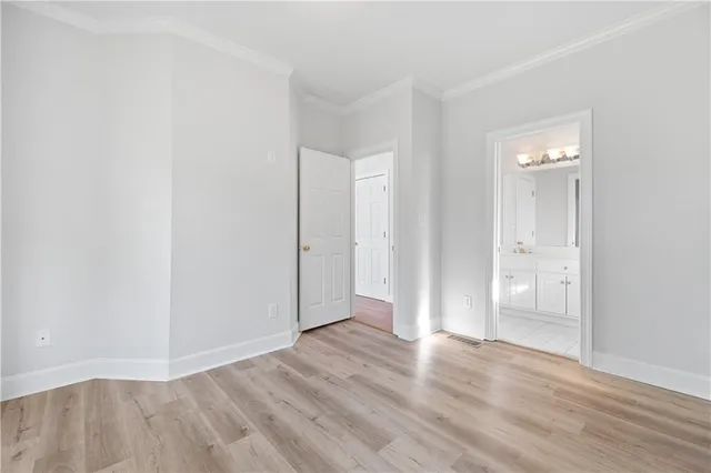 a view of staircase with railing and a large window