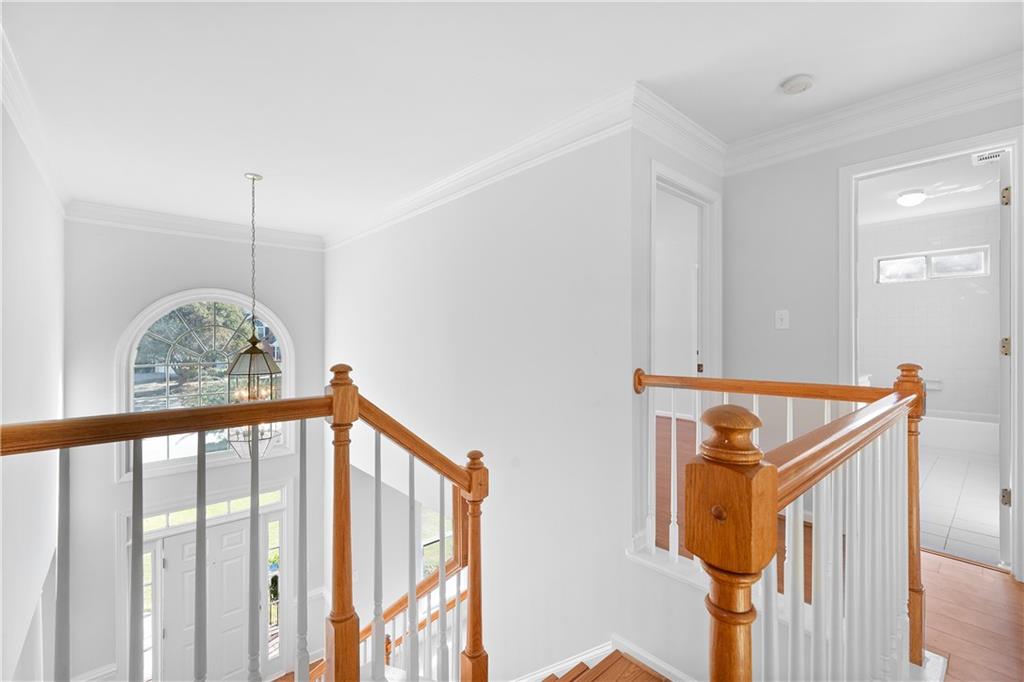 1810 Sunset Harbour Pointe Lawrenceville, GA 30043 - Photo 23 of 56 a view of a hallway with stairs