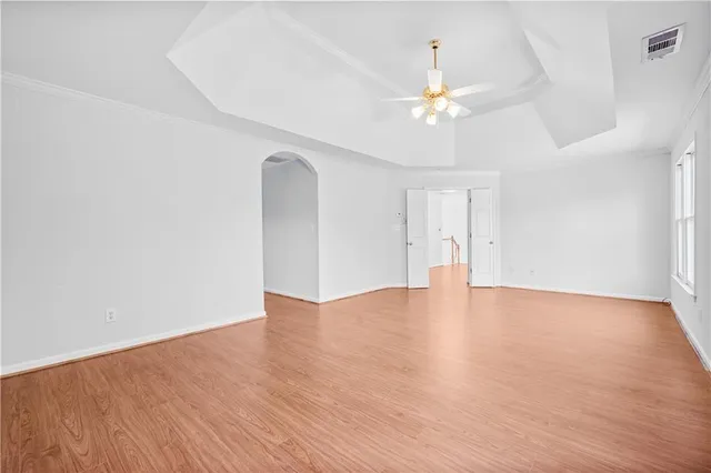 a spacious bathroom with a double vanity sink and a mirror