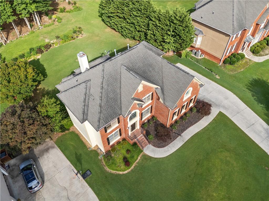1810 Sunset Harbour Pointe Lawrenceville, GA 30043 - Photo 3 of 56 an aerial view of a house with outdoor space