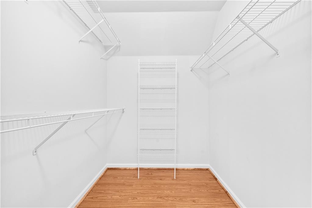 1810 Sunset Harbour Pointe Lawrenceville, GA 30043 - Photo 31 of 56 a view of a room with racks on the wall