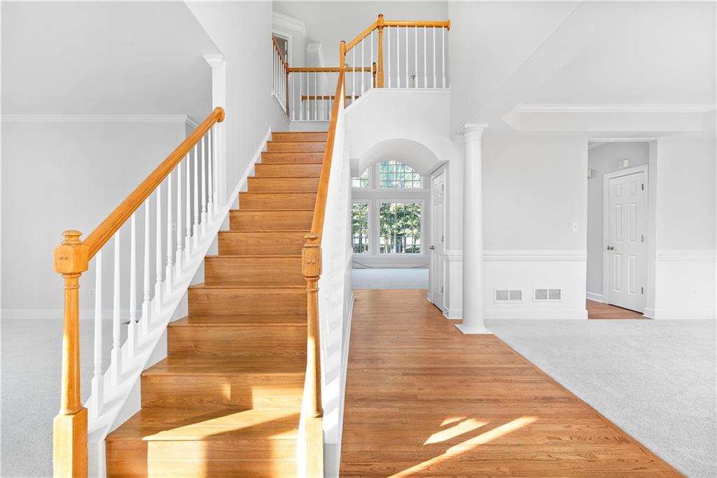 1810 Sunset Harbour Pointe Lawrenceville, GA 30043 - Photo 4 of 56 a view of entryway and hall with wooden floor