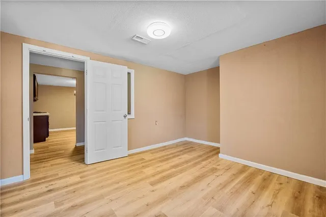 a view of a house with swimming pool and a yard