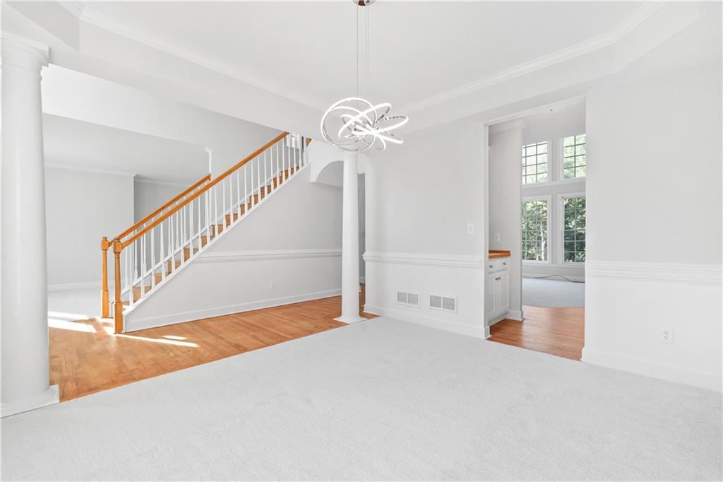 1810 Sunset Harbour Pointe Lawrenceville, GA 30043 - Photo 10 of 56 a view of entryway and hall with a chandelier