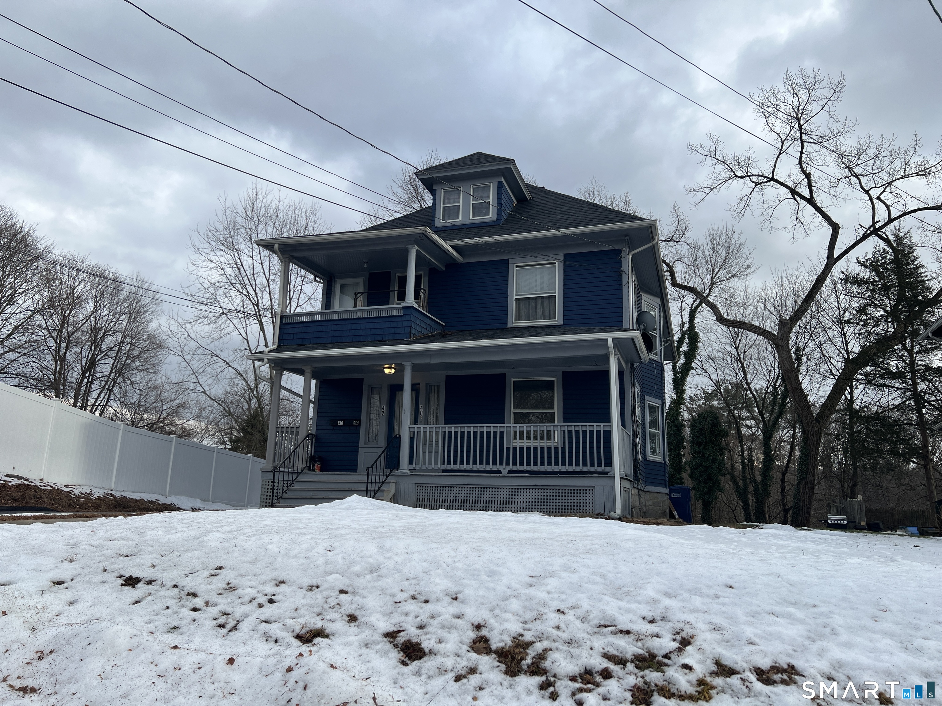 40 Prospect Street Ansonia, CT 06401 - Photo 4 of 31 a front view of a house with a yard