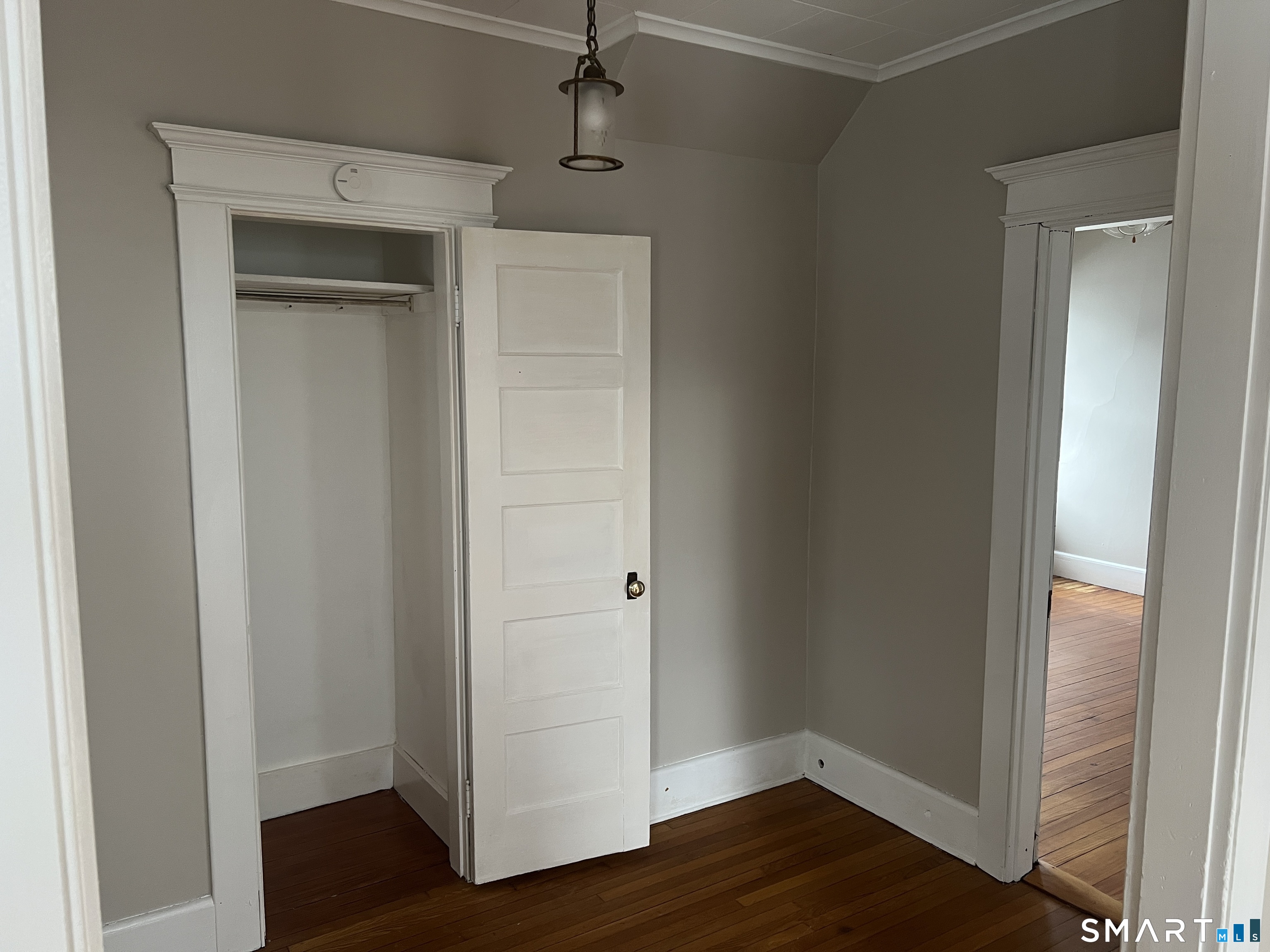 40 Prospect Street Ansonia, CT 06401 - Photo 7 of 31 a view of an empty room with wooden floor
