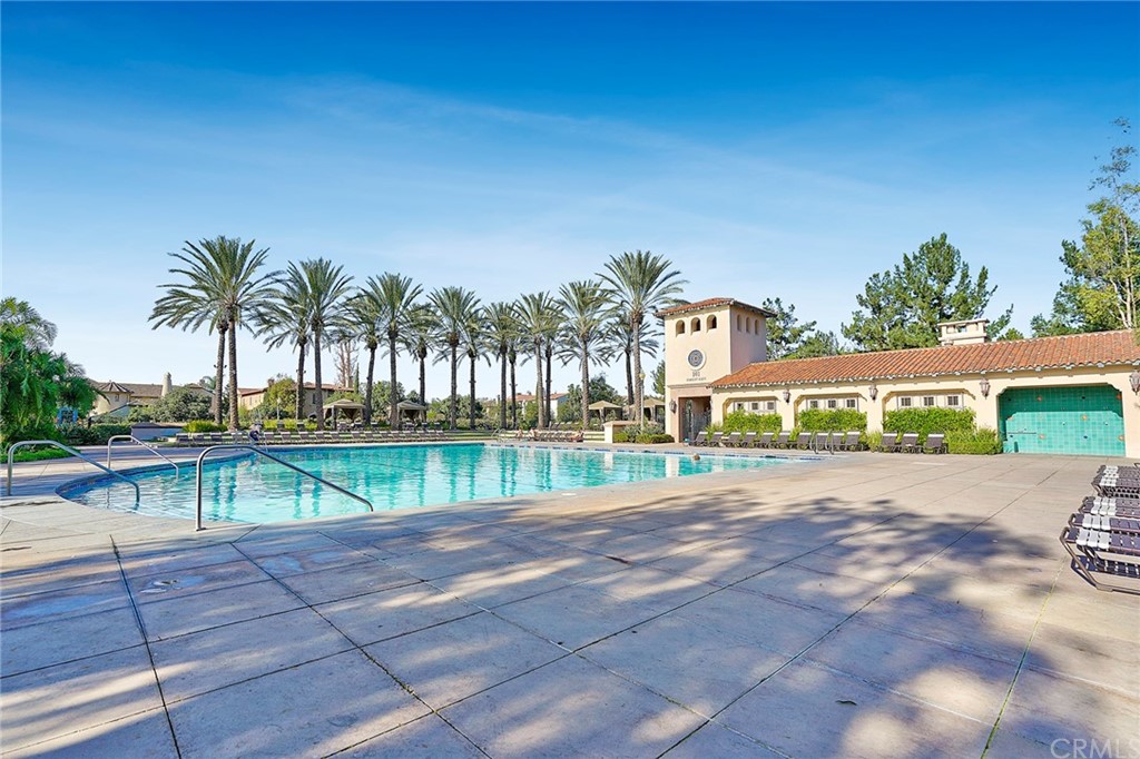 44 Modesto Irvine, CA 92602 - Photo 22 of 35 a view of swimming pool with outdoor seating and yard in the back