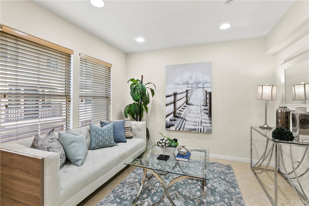 44 Modesto Irvine, CA 92602 - Photo 5 of 35 a living room with furniture and floor to ceiling windows