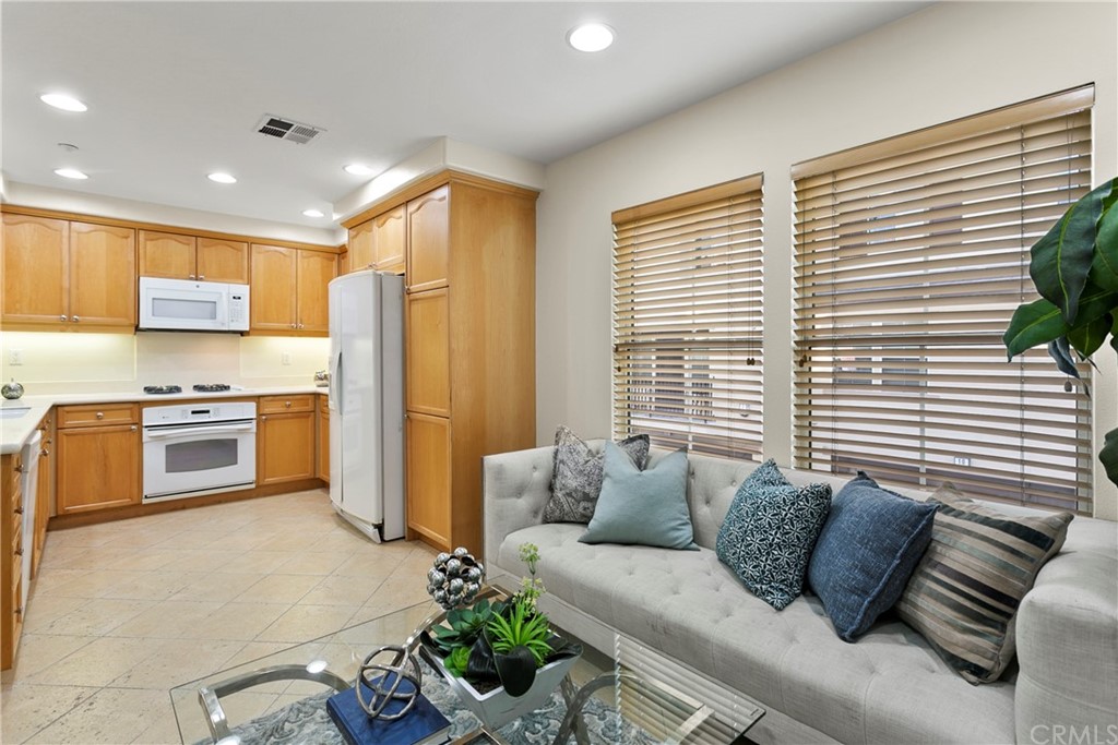44 Modesto Irvine, CA 92602 - Photo 6 of 35 a living room with furniture and kitchen view
