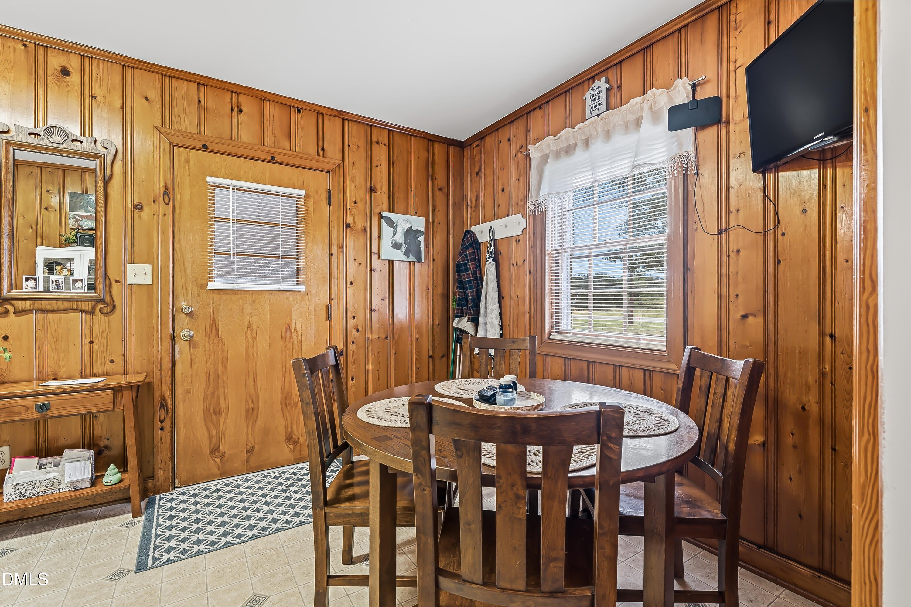4967 Highway 581 Spring Hope, NC 27882 - Photo 20 of 44 a view of a dining room with furniture window and outside view