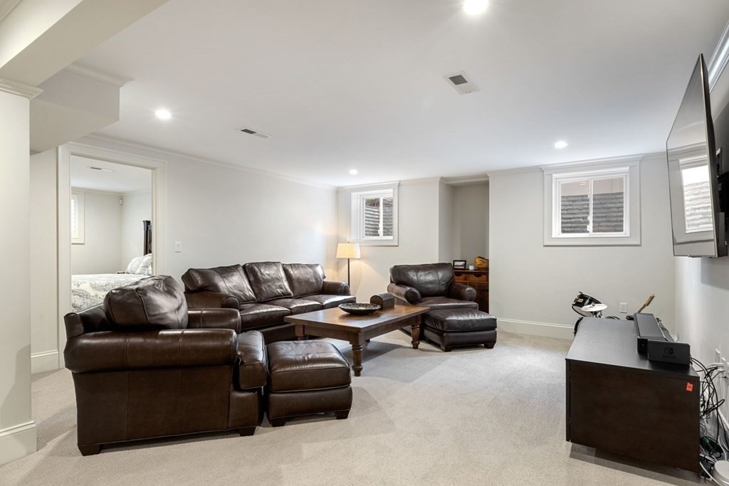 48 MacArthur Road Wellesley, MA 02482 - Photo 23 of 26 a living room with furniture