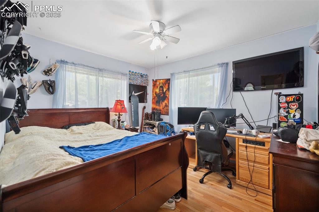985 Fuller Road Colorado Springs, CO 80920 - Photo 15 of 30 a living room with furniture and a flat screen tv