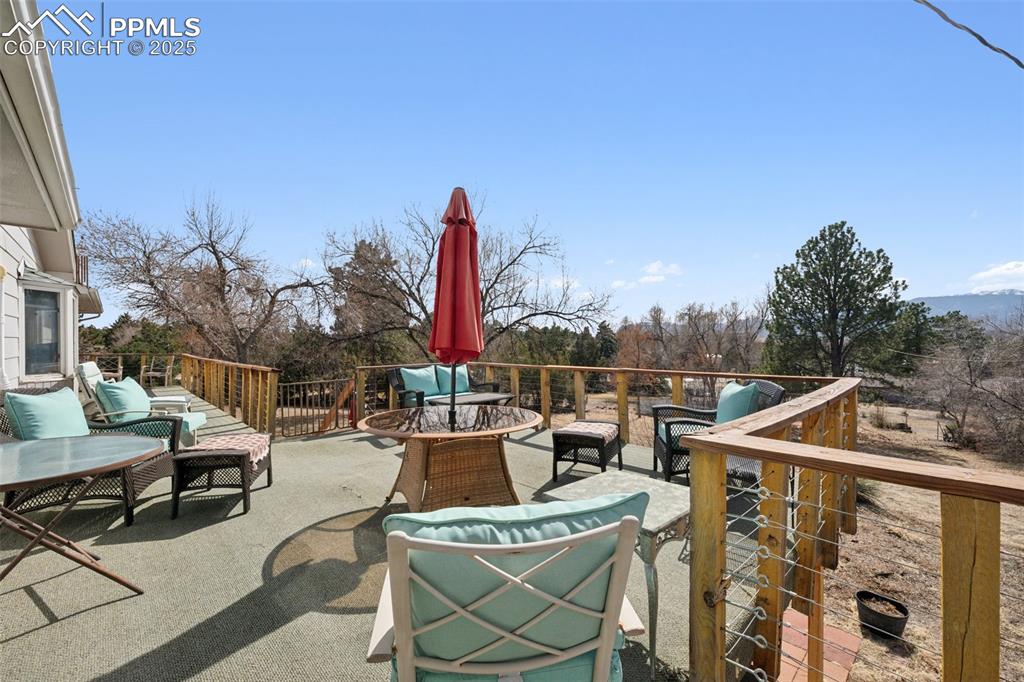 985 Fuller Road Colorado Springs, CO 80920 - Photo 20 of 30 a view of a patio with couches table and chairs