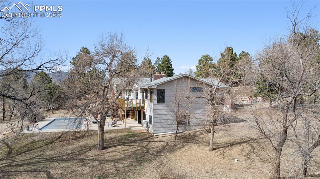 985 Fuller Road Colorado Springs, CO 80920 - Photo 3 of 30 a view of a house with a yard