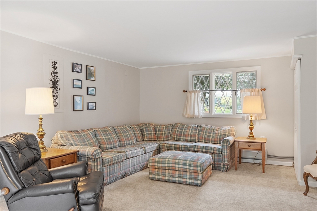 11 Parlee Road Chelmsford, MA 01824 - Photo 12 of 33 a living room with furniture and a window