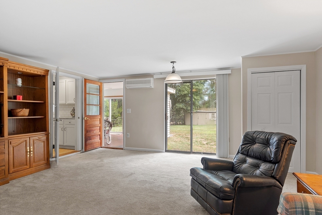 11 Parlee Road Chelmsford, MA 01824 - Photo 14 of 33 a living room with furniture and floor to ceiling window