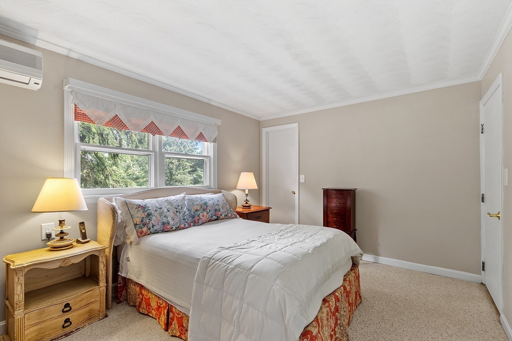 11 Parlee Road Chelmsford, MA 01824 - Photo 21 of 33 a bedroom with a bed and a window