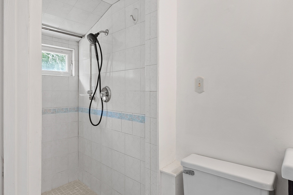 11 Parlee Road Chelmsford, MA 01824 - Photo 24 of 33 a bathroom that has a shower toilet and a shower