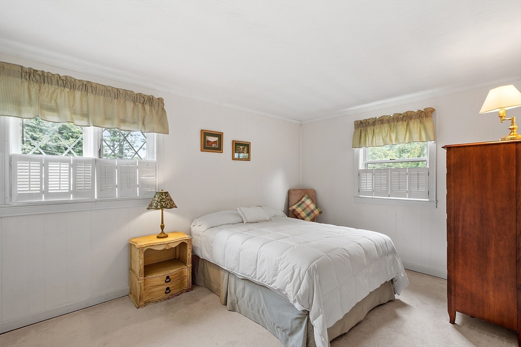11 Parlee Road Chelmsford, MA 01824 - Photo 26 of 33 a bedroom with a bed and a window
