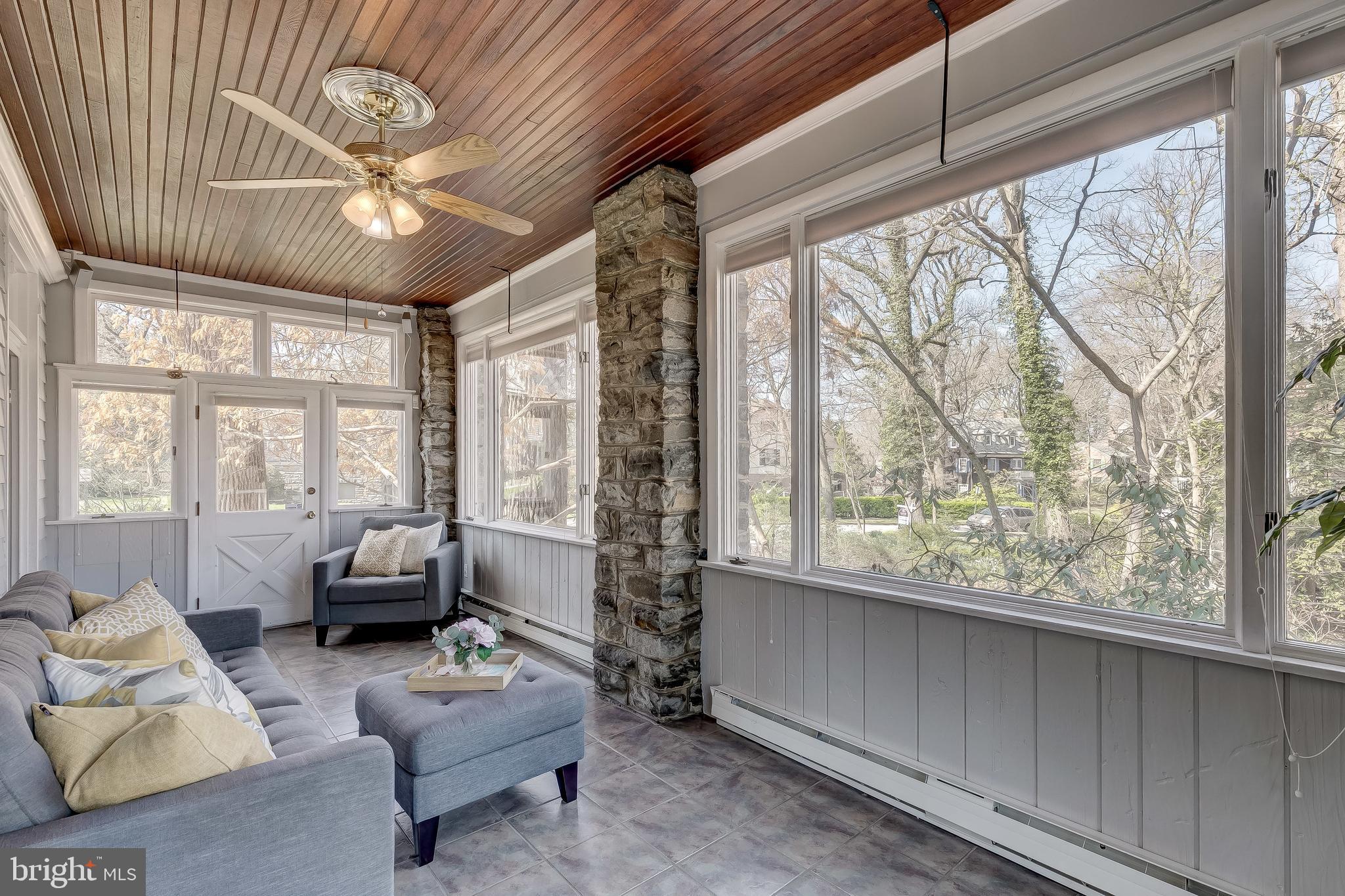 112 Longwood Road Baltimore, MD 21210 - Photo 19 of 77 Bright and cozy sunroom