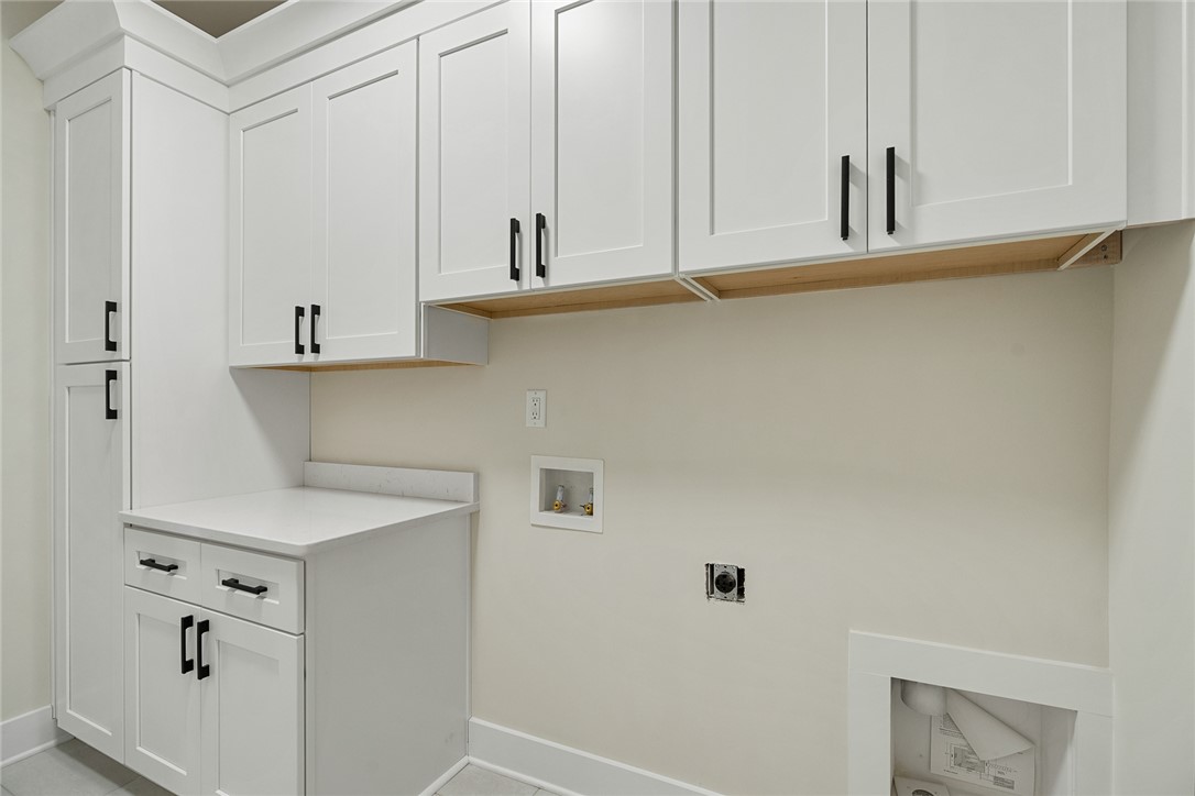 100 Garden Gate Drive Anderson, SC 29621 - Photo 35 of 43 This bright utility space features ample cabinetry and a clean aesthetic.