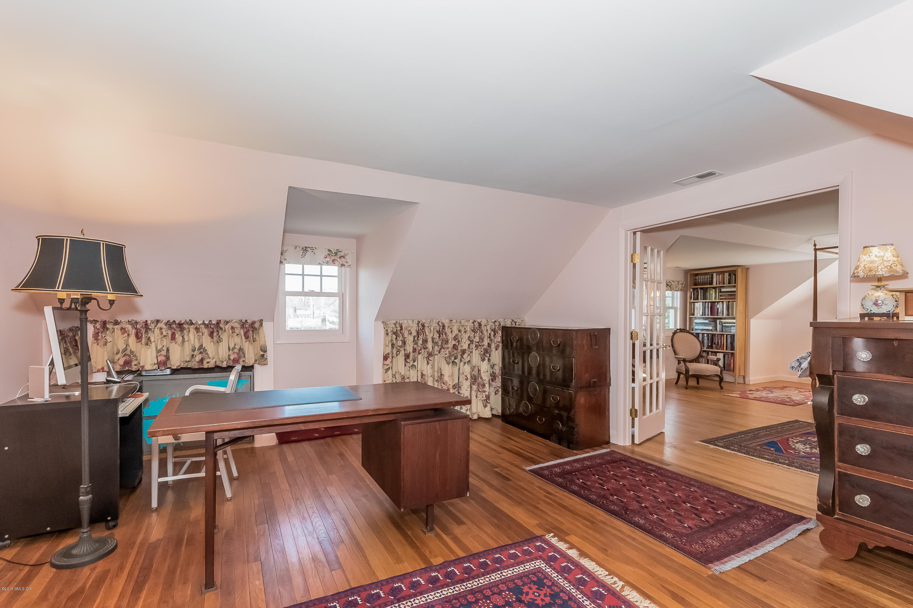355 Riverside Avenue Riverside, CT 06878 - Photo 13 of 24 a living room with furniture and a wooden floor