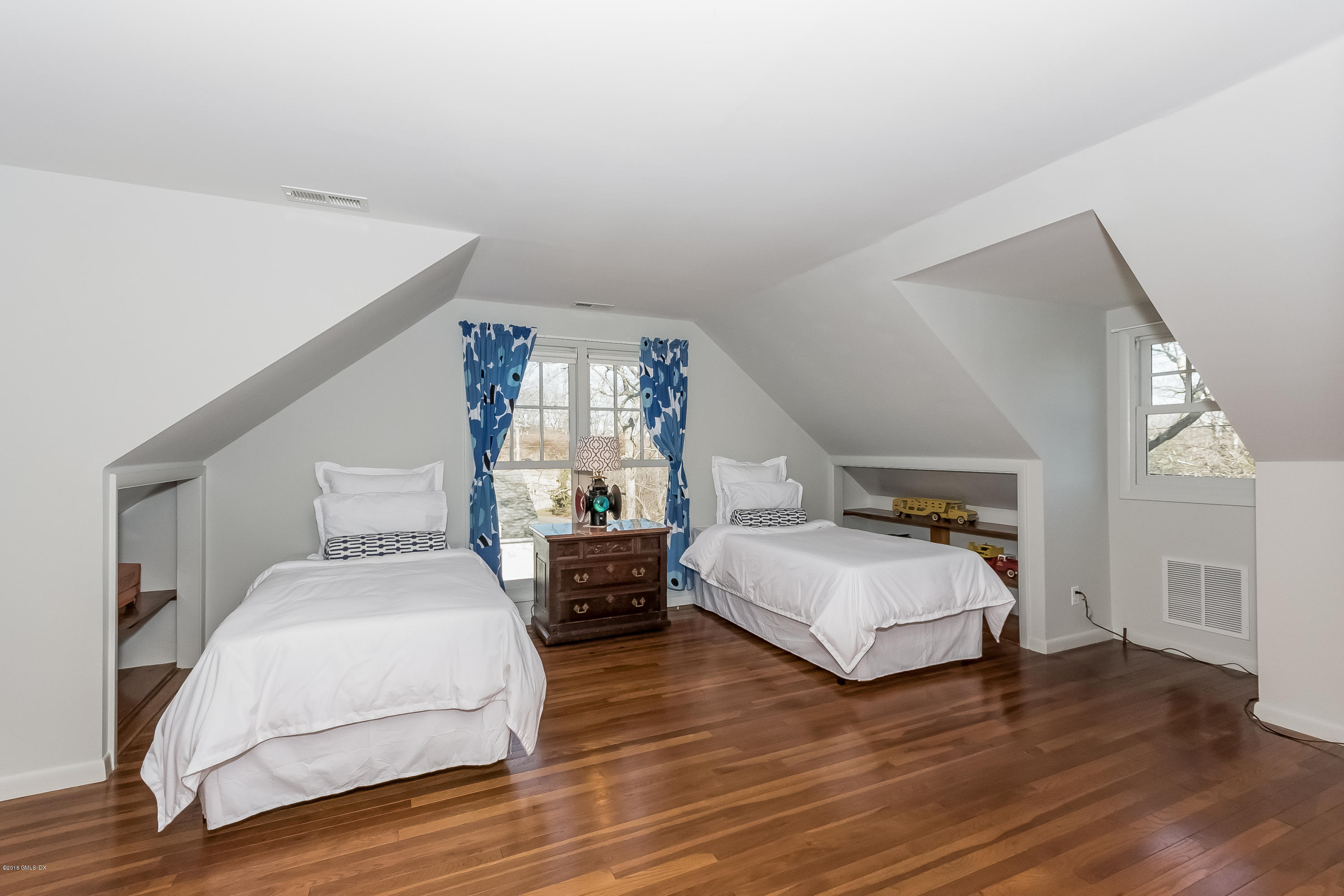 355 Riverside Avenue Riverside, CT 06878 - Photo 14 of 24 a bedroom with bed and window