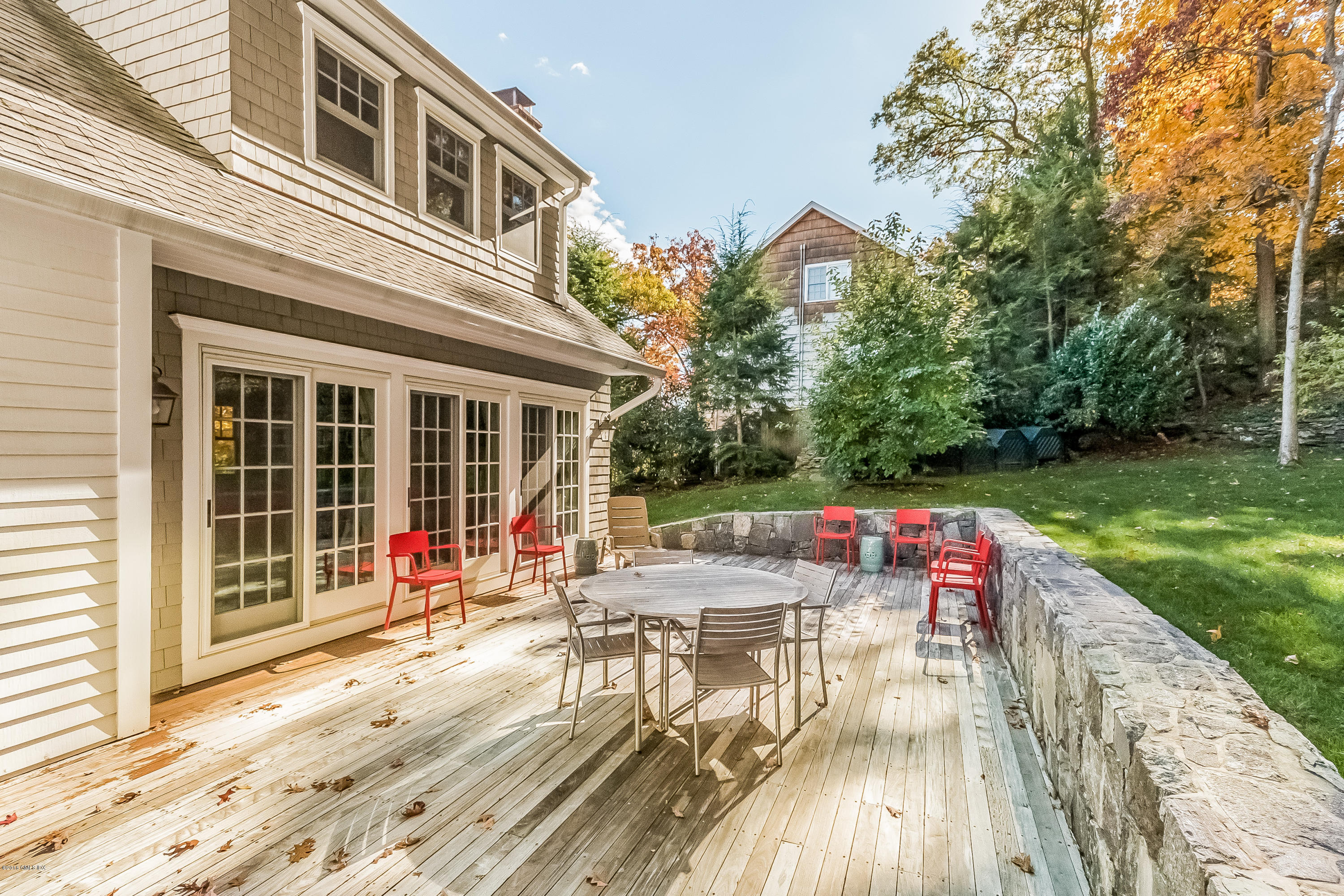 355 Riverside Avenue Riverside, CT 06878 - Photo 20 of 24 a house view with a seating space and garden view