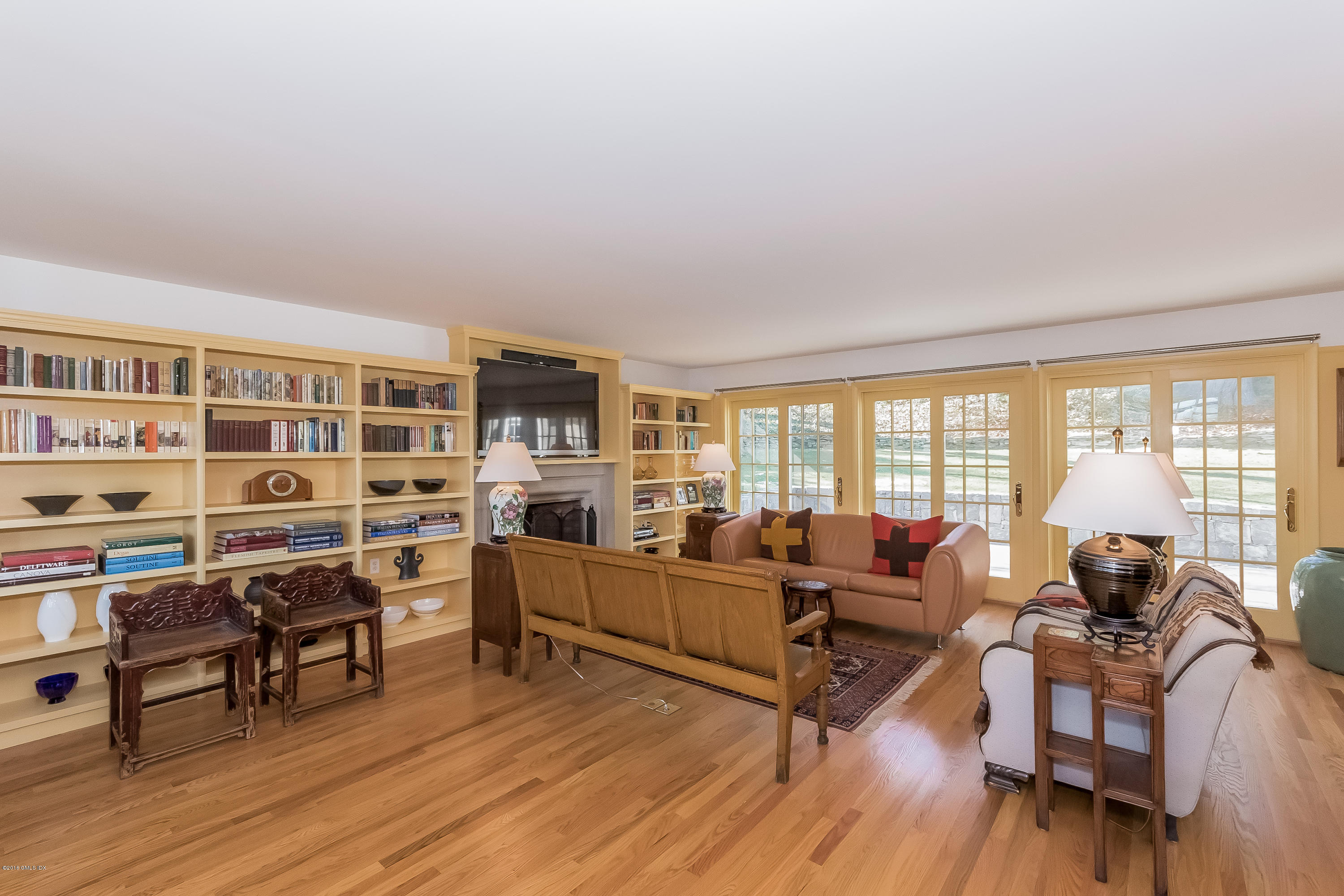355 Riverside Avenue Riverside, CT 06878 - Photo 8 of 24 a living room with furniture and a wooden floor