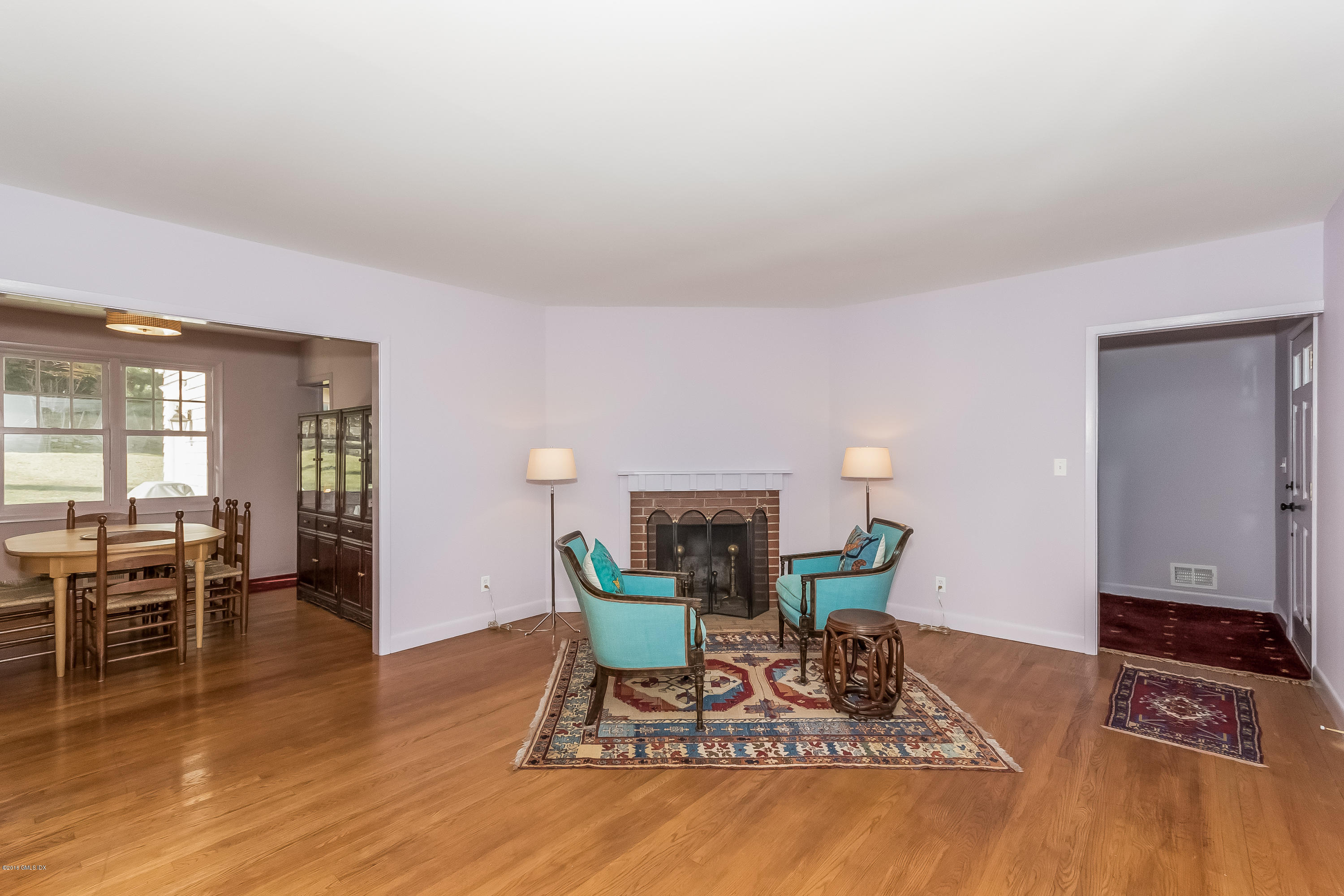 355 Riverside Avenue Riverside, CT 06878 - Photo 10 of 24 a living room with furniture and wooden floor