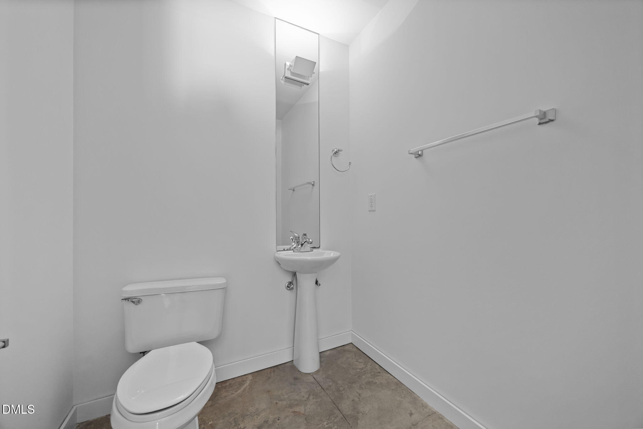 319 Fayetteville Street, Unit 210 Raleigh, NC 27601 - Photo 12 of 61 a white toilet sitting next to a shower