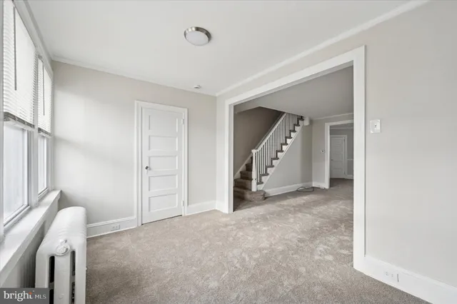 a view of a livingroom with a staircase