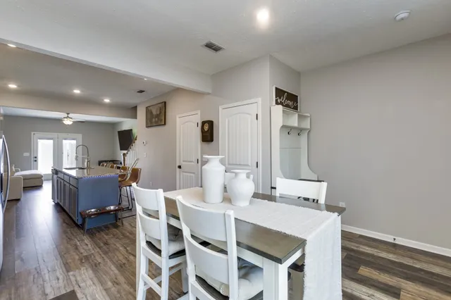 a view of a dining room with furniture