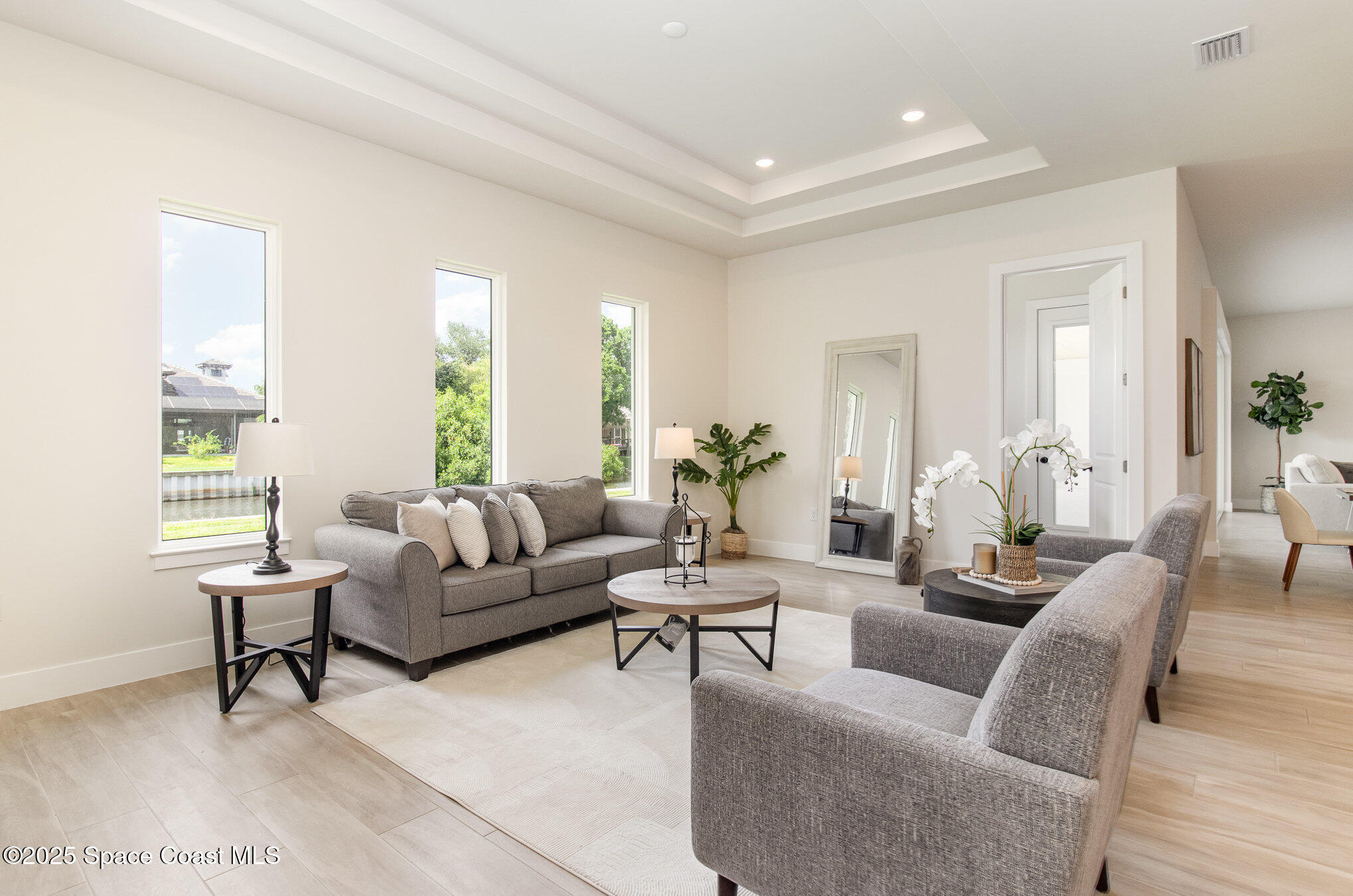 508 Topsail Drive Rockledge, FL 32955 - Photo 16 of 41 a living room with furniture and a large window