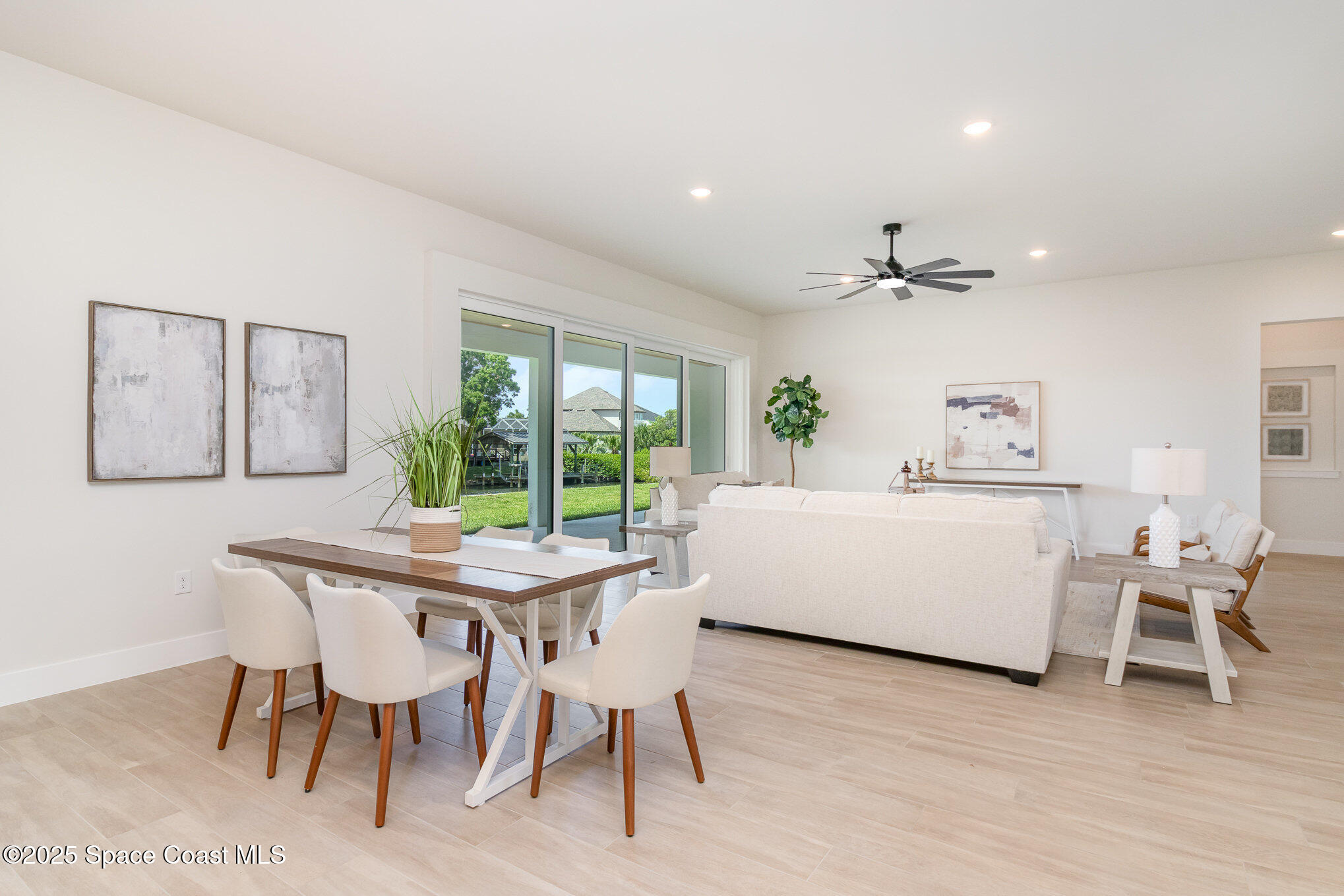 508 Topsail Drive Rockledge, FL 32955 - Photo 17 of 41 a living room with furniture and a large window