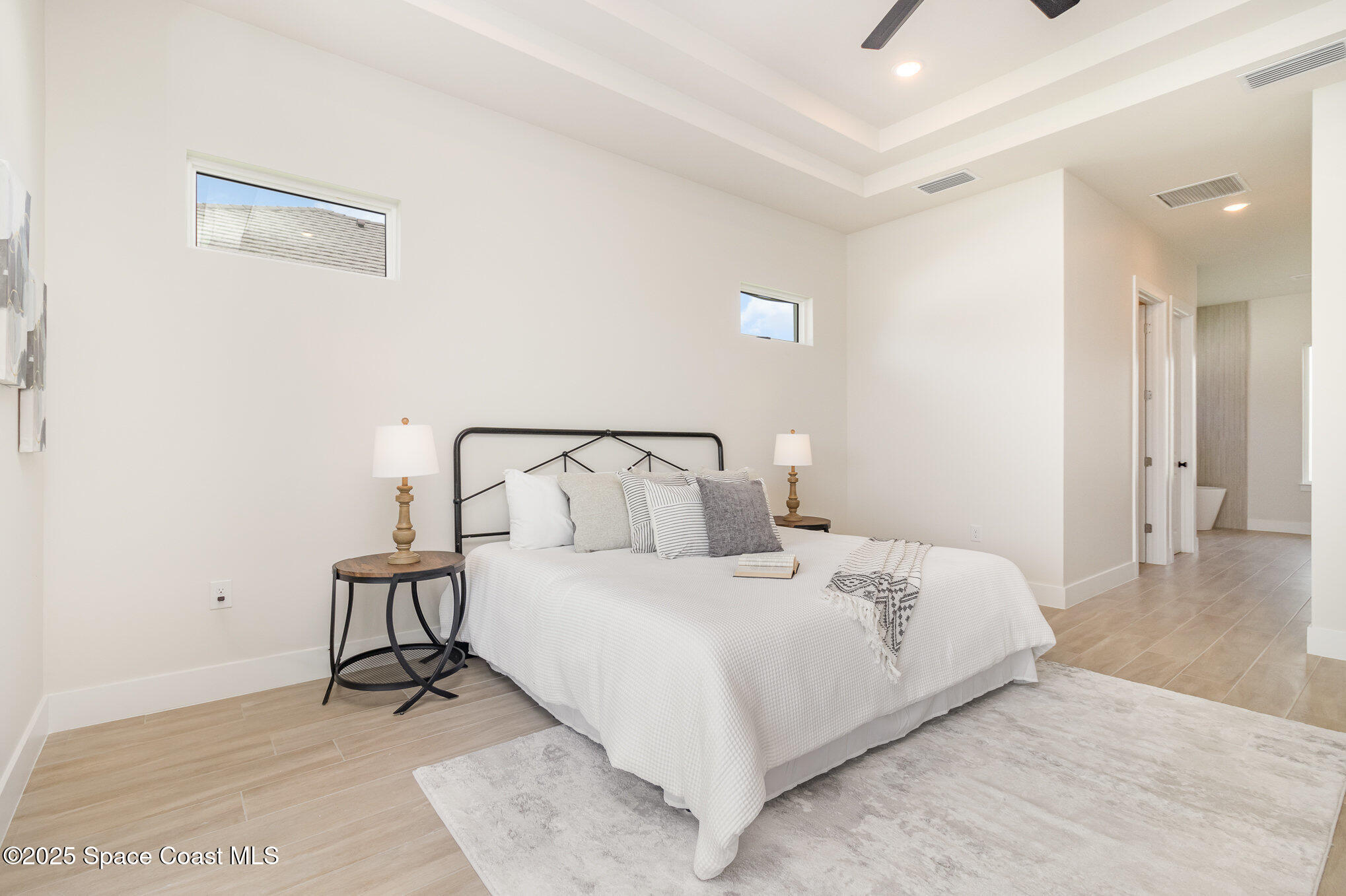 508 Topsail Drive Rockledge, FL 32955 - Photo 29 of 41 a bedroom with a bed and a table