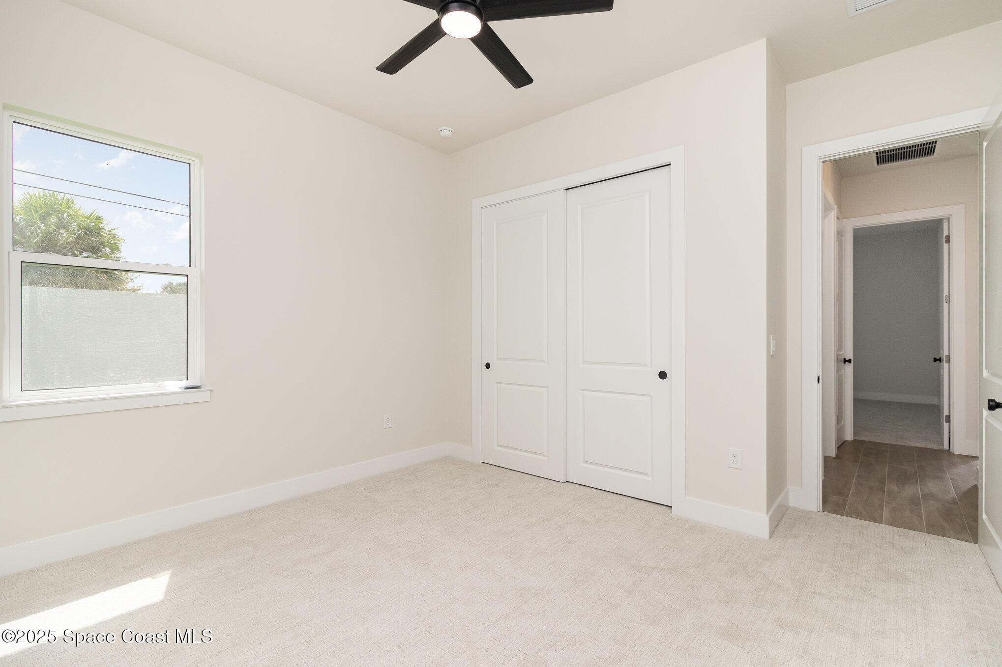 508 Topsail Drive Rockledge, FL 32955 - Photo 32 of 41 a view of an empty room with a window