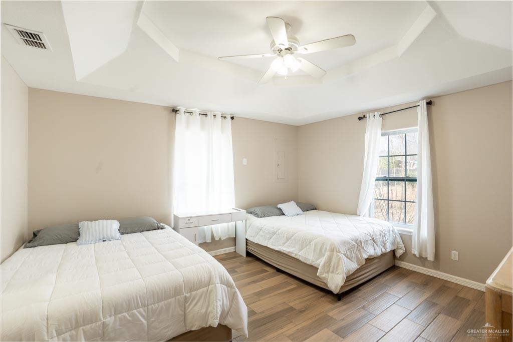 5108 South 33rd Street McAllen, TX 78503 - Photo 11 of 17 a bedroom with a bed and window