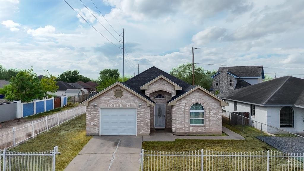 5108 South 33rd Street McAllen, TX 78503 - Photo 12 of 17 a front view of a house with a yard