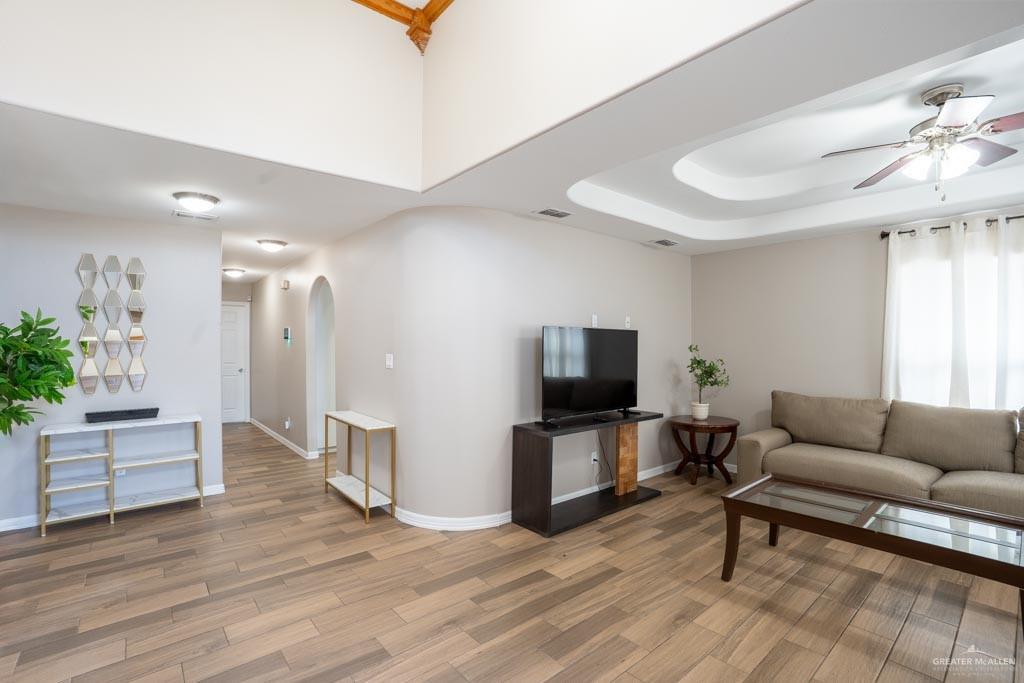 5108 South 33rd Street McAllen, TX 78503 - Photo 3 of 17 a living room with furniture and a flat screen tv