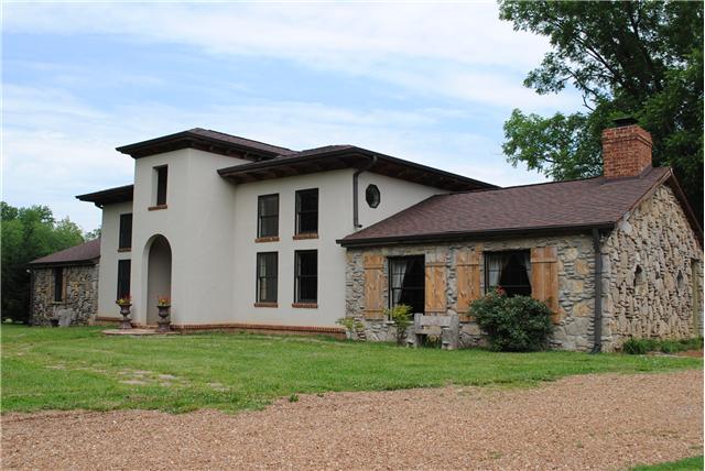7650 Jones Road - Magnificent Tuscan estate tucked away on 5.08 acres, 3 bay stone garage, pond, barn. Extraordinary home: travertine, slate, brushed rainforest marble, granite, pine ceiling, Viking range, dbl shower, all bells & whistles. Ad'tl 17.5