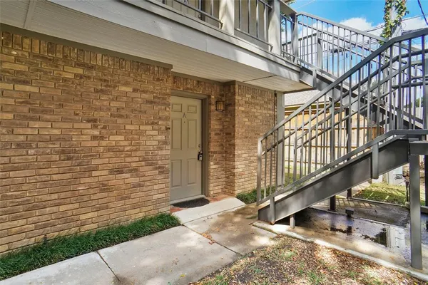 a view of balcony with wooden stairs