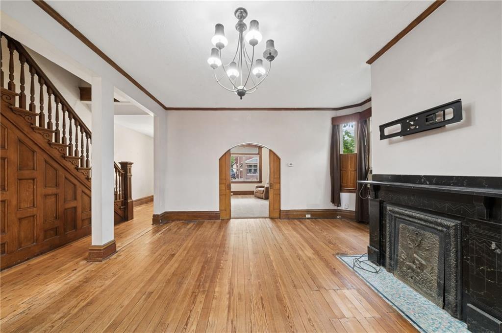 1523 Evergreen Road Pittsburgh, PA 15209 - Photo 7 of 35 a view of a livingroom with wooden floor