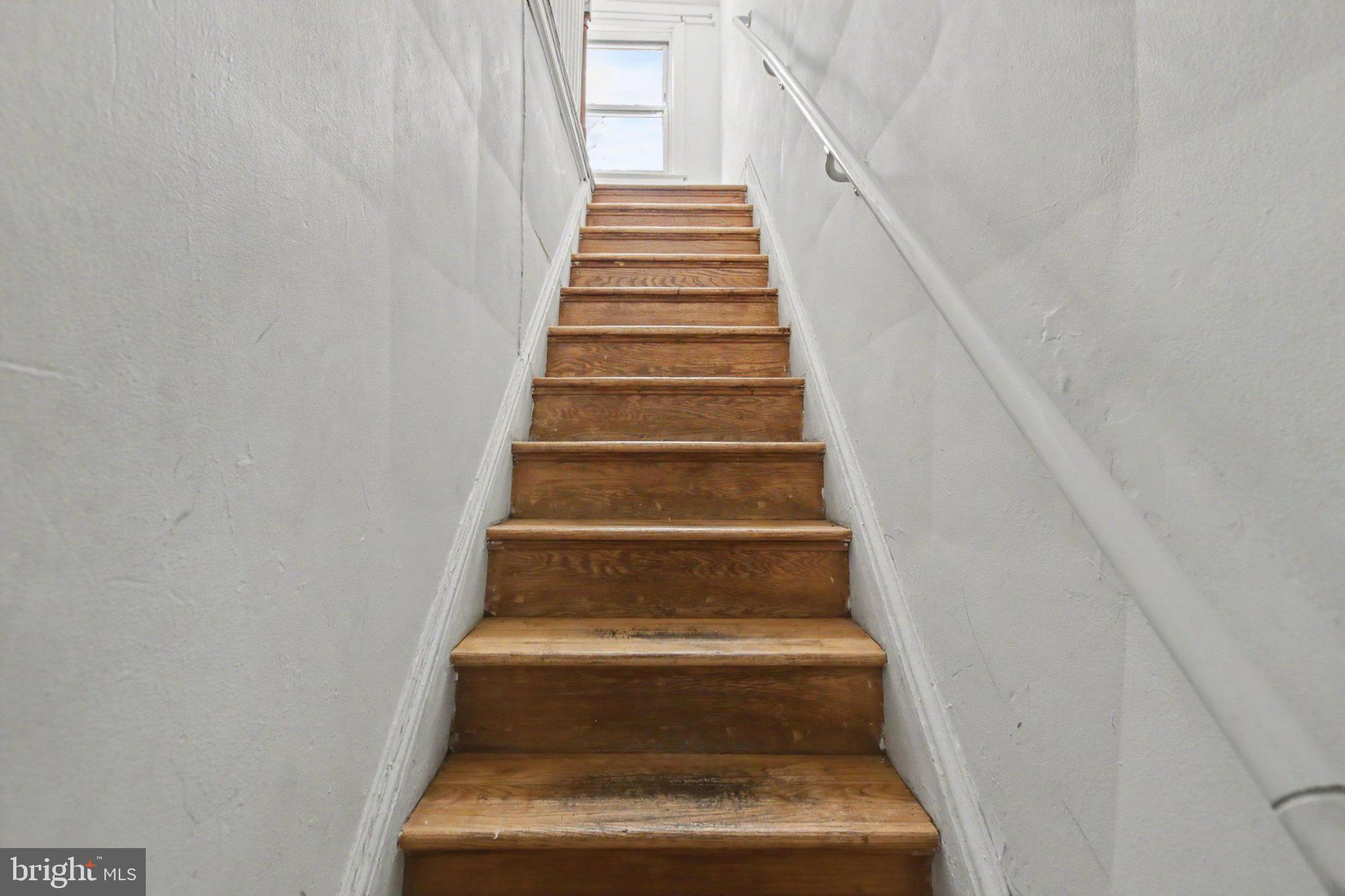 4898 Sheriff Road Northeast Washington, DC 20019 - Photo 3 of 19 Upper level stairwell