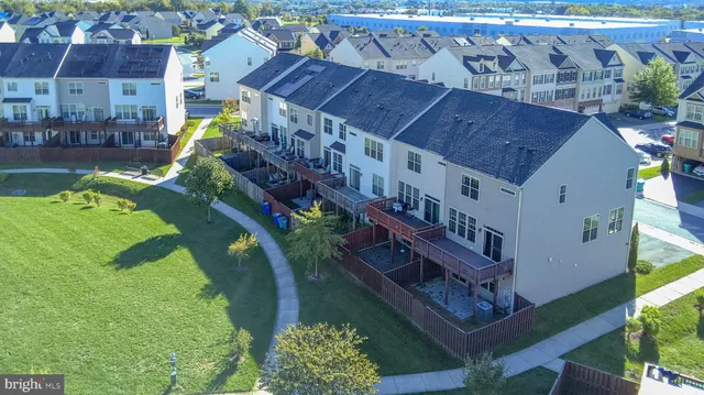 a aerial view of a house with a yard