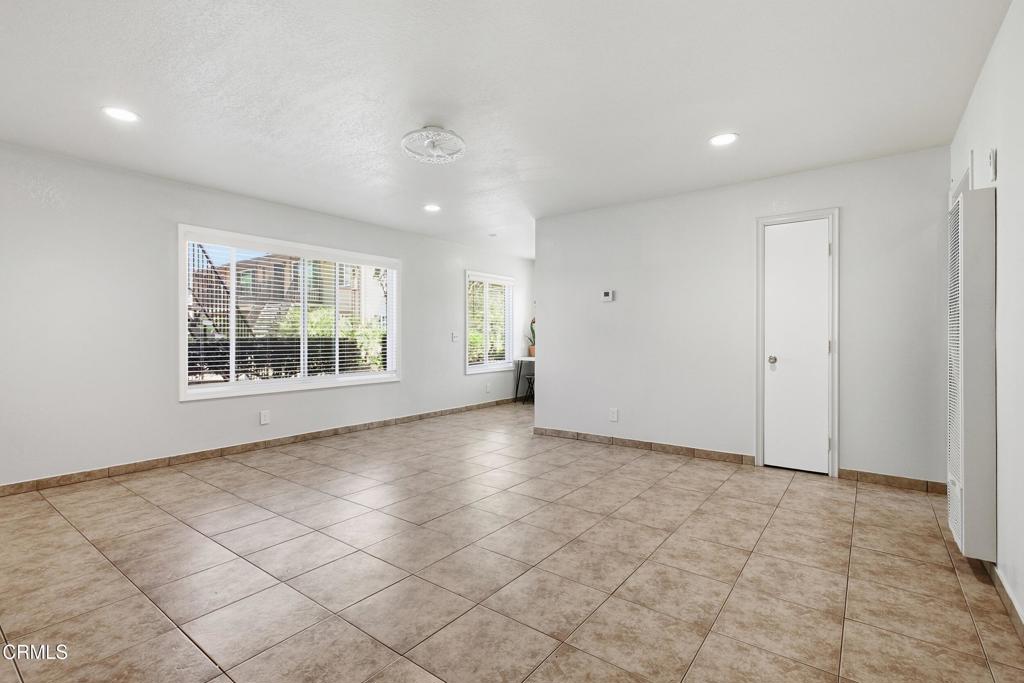 1920 North H Street, Unit 133 Oxnard, CA 93036 - Photo 3 of 14 an empty room with windows and closet