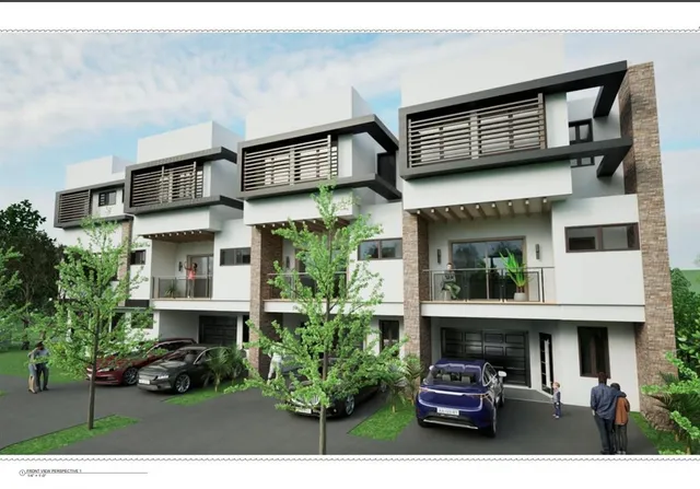 a building view with a garden space