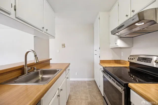 a view of swimming pool with outdoor seating