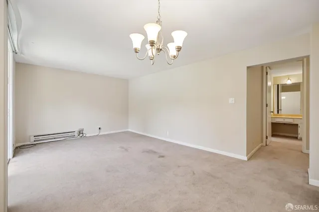 a kitchen with stainless steel appliances granite countertop a sink and a stove