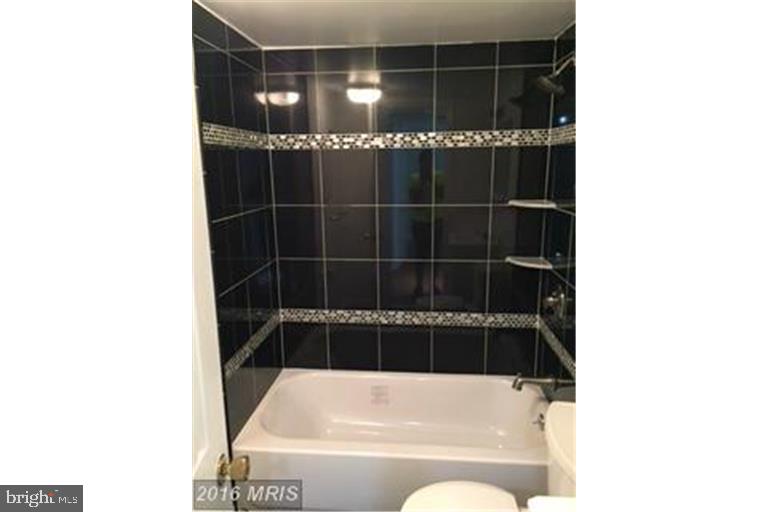 2016 37th Street Southeast, Unit 202 Washington, DC 20020 - Photo 2 of 21 Renovated bathroom